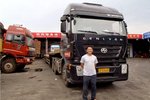 李官林:开杰狮每天可以穿西装打领带了
