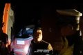 扣12分 超载货车故意污损号牌强行冲卡
