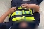 城管被货车碰倒 能打电话但不起来