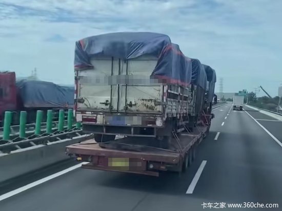 大板车背3辆4米2 子母车抱团省高速费 网友：这太正常了