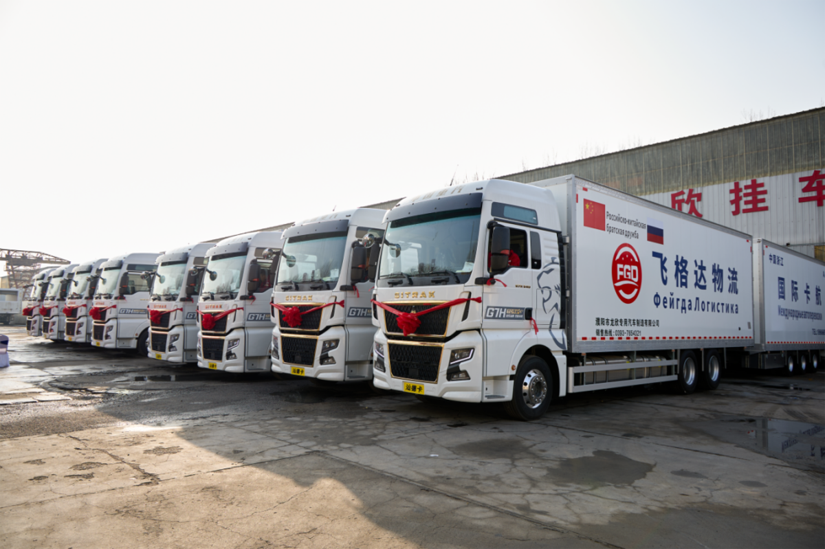 凝心聚力 决胜开门红  汕德卡TIR跨境运输100台暨首批50台成功交付！ba8bbea0cca15322a4072b572ae39884