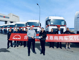 以硬核运力助跑跨境通道 10台曼恩TGX交付鼎盛易嘉